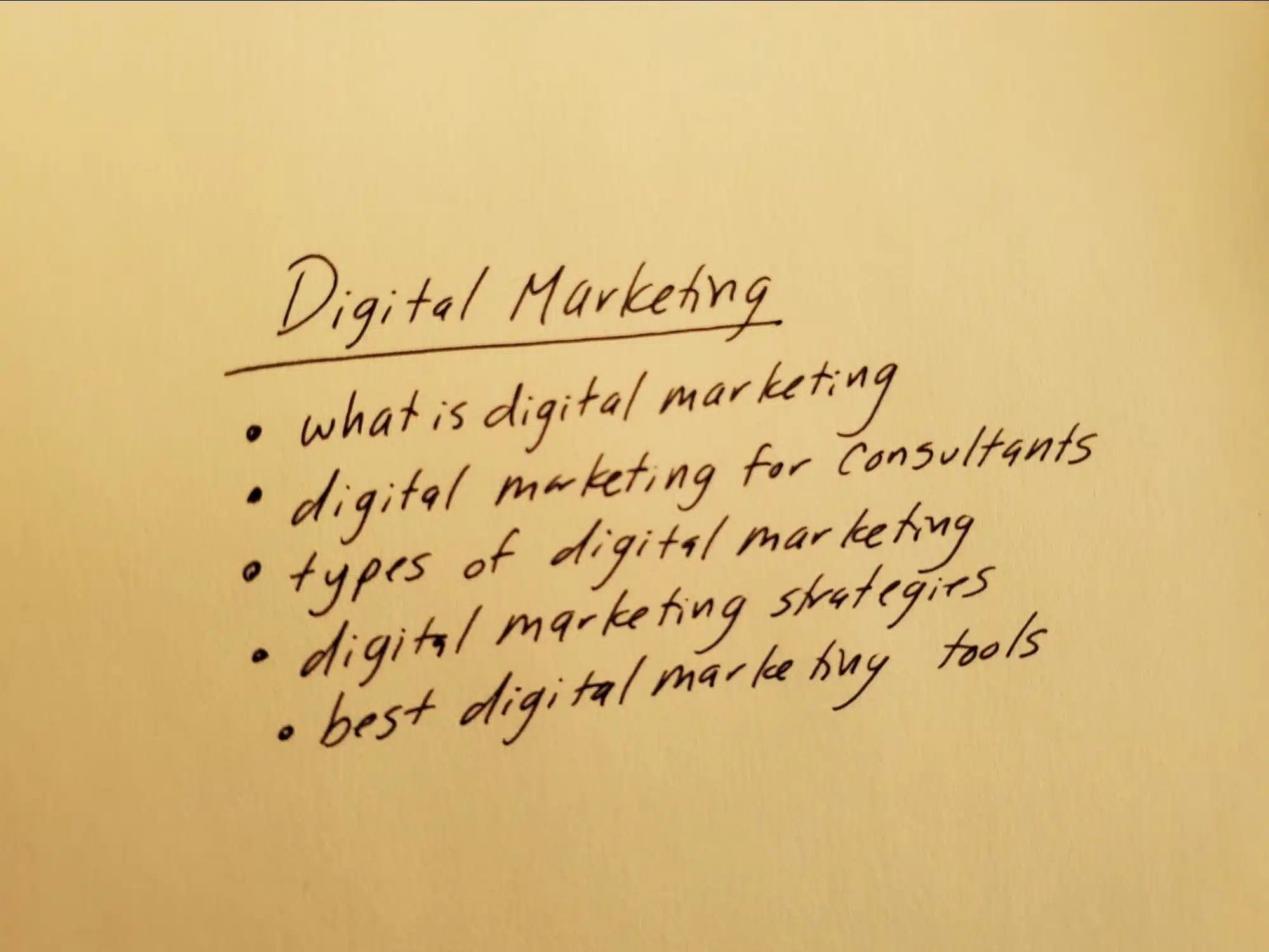 Digital marketing keyword list written on scratch paper