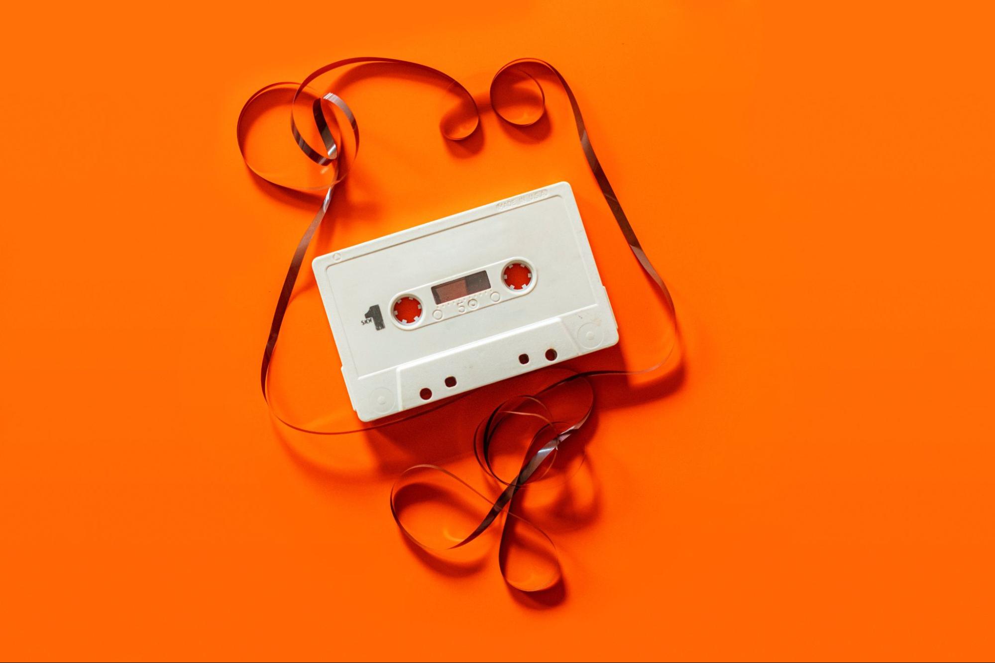 Cassette tape on orange background