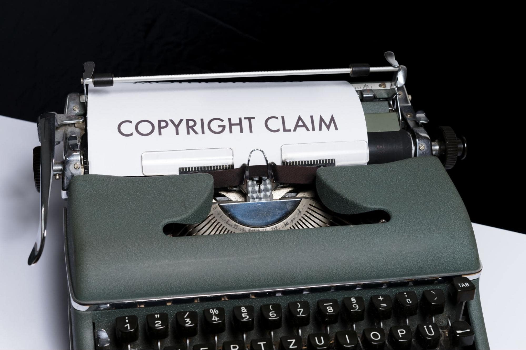 Typewriter with paper that says "Copyright claim"